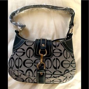 Brand new purse with stuffing & handle cover!